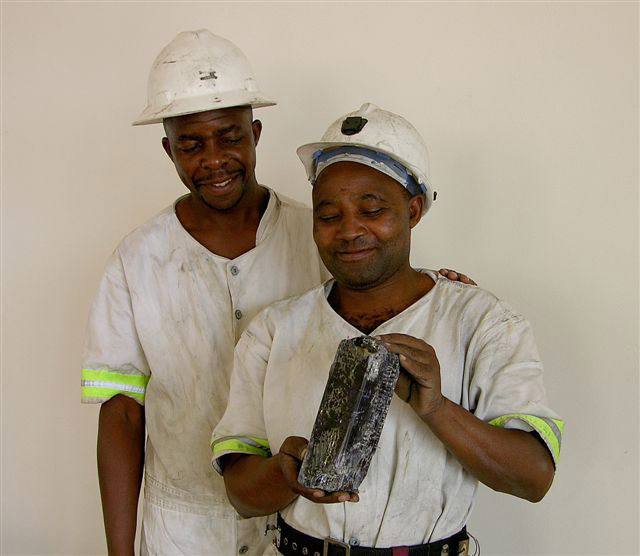 Miners Display Rough Tanzanite photo image